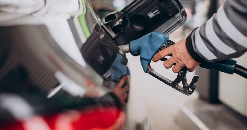 Car refueling at fuel station